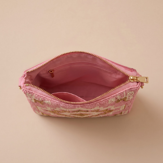 Pink geometric hand-beaded crossbody bag interior
