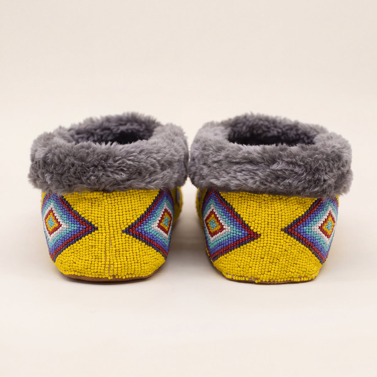 Yellow Thunderbird Fur Cuff Beaded Moccasins For Women