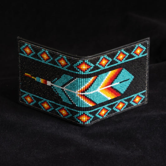 Black beaded leather bifold wallet with turquoise coral orange and cream feather arrow pattern