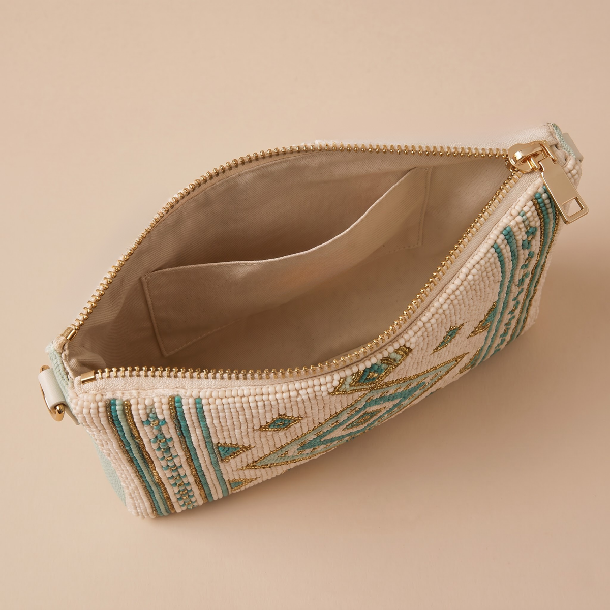 Ivory geometric hand-beaded crossbody bag interior