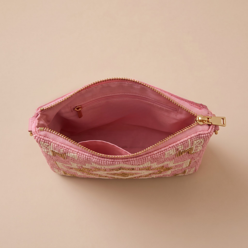 Pink geometric hand-beaded crossbody bag interior