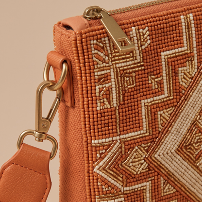 Rust geometric hand-beaded crossbody bag beadwork detail