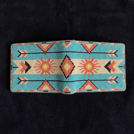 Flat alternate view of turquoise beaded leather wallet with peach sunbursts and arrow motifs