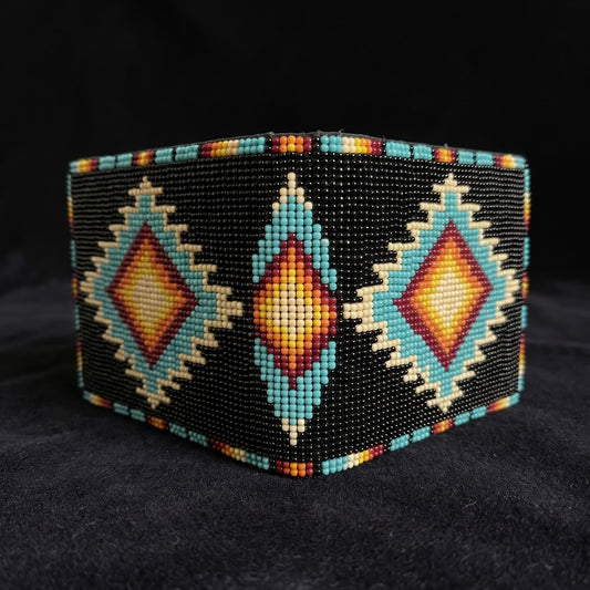 Alternate unfolded view of black beaded leather wallet with turquoise cream orange and red step diamonds