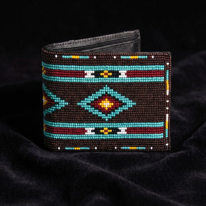 Dark brown hand-beaded leather bifold wallet with turquoise border lines and a centered orange yellow diamond motif
