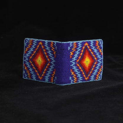 Blue leather bifold wallet with red orange and yellow twin diamond hand-beaded geometric design
